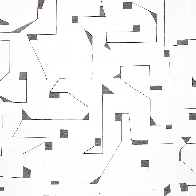 Abstract geometric pattern in black and gray angular lines with small square accents; contemporary decor print.