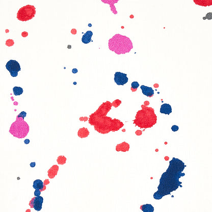 White background with bright red, pink, and blue watercolor paint splatters and blobs.