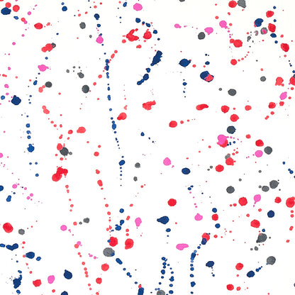 Abstract paint splatter pattern in red, pink, blue and gray on white background.