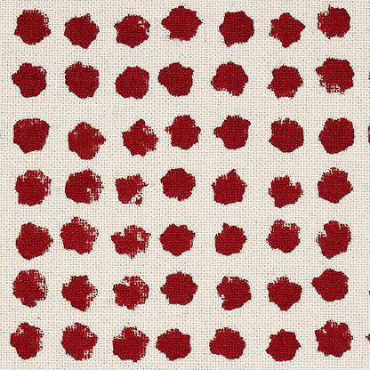 Beige linen fabric with evenly spaced red circular blotch dots in a grid pattern.
