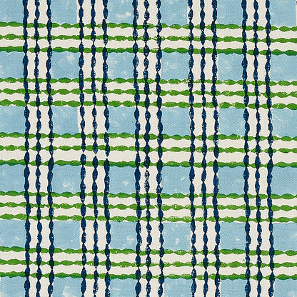 Hand-block-printed trellis pattern on fabric, sky blue background with grass green lattice design.
