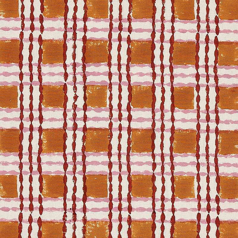 Trellis hand block print textile with copper and rose lattice pattern.