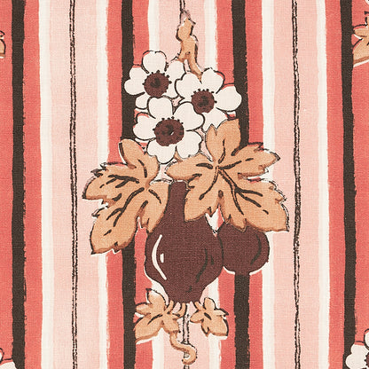 Striped pink, coral and cream textile backdrop featuring a dark brown vase, white flowers and tan leaves.