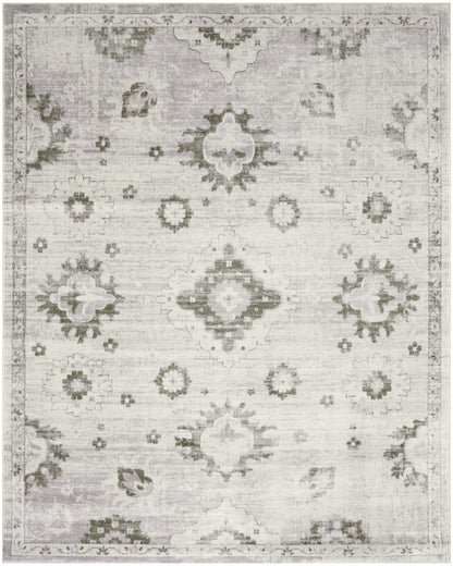 Distressed light gray-beige oriental area rug with faded medallion motifs and subtle border.