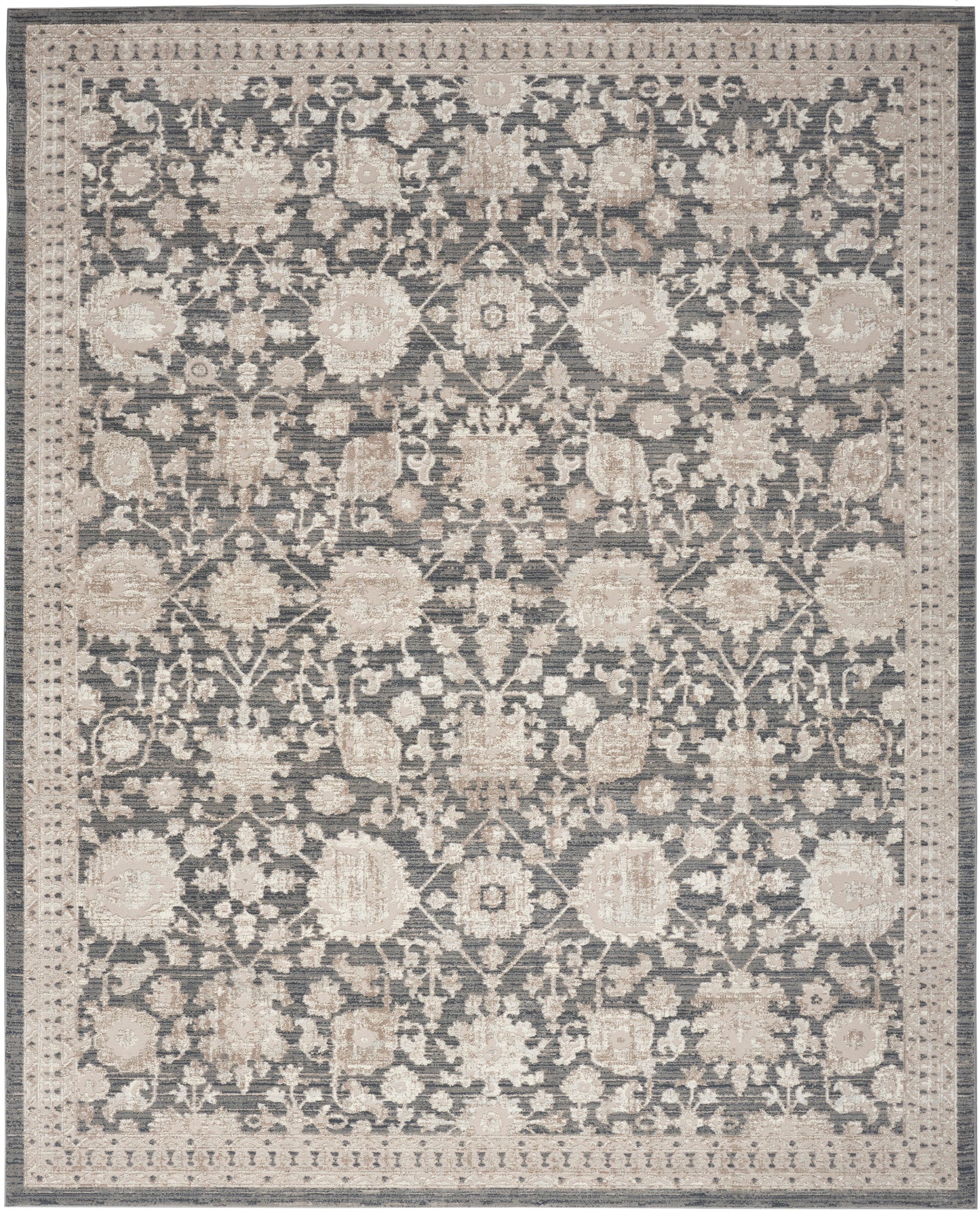 Rectangular area rug with muted blue-gray field and cream floral pattern, ornate border, traditional oriental style.