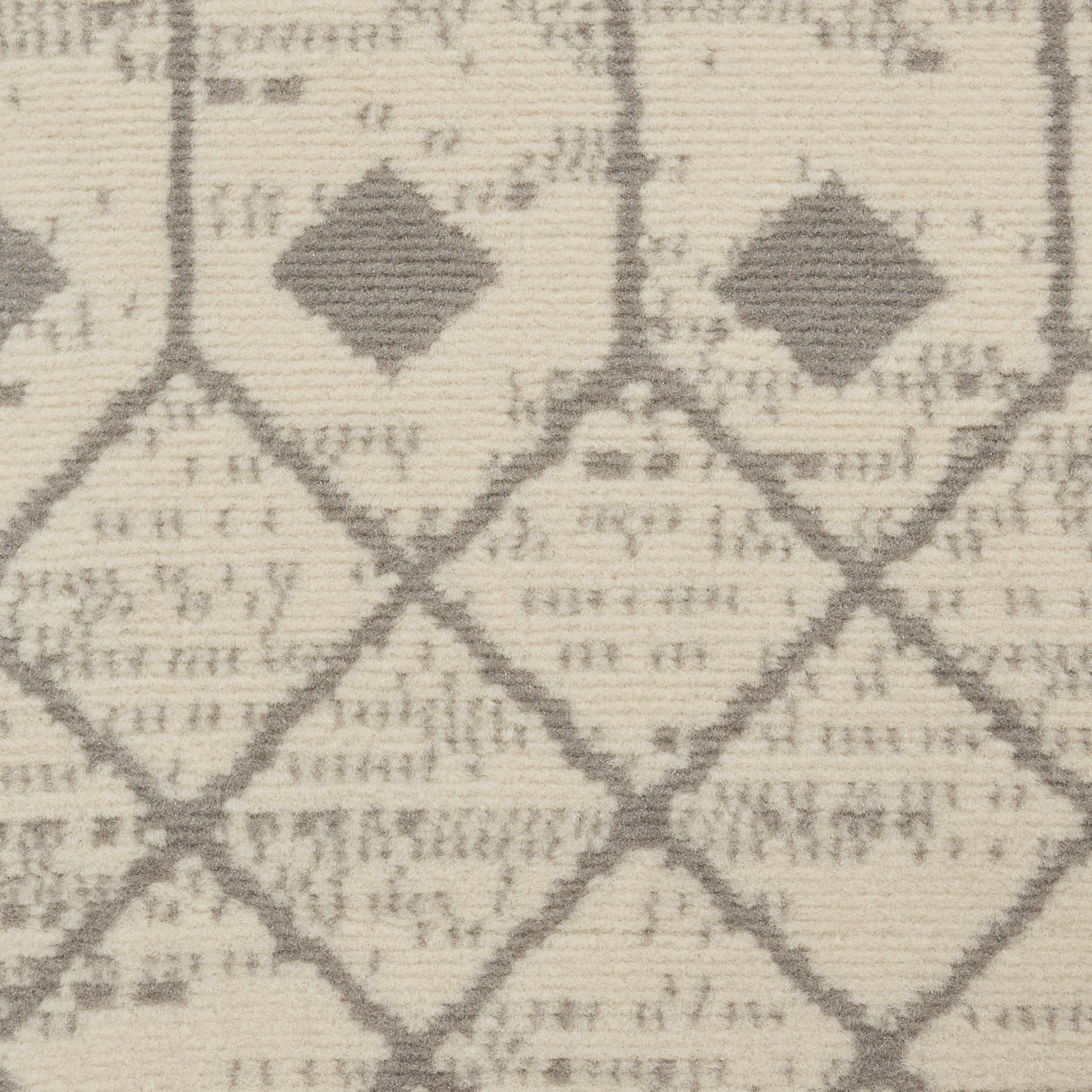 Cream & grey woven runner rug with a diamond lattice pattern and small interior diamonds.