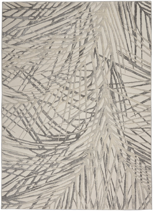 Beige rug with abstract gray palm-leaf pattern; rustic-inspired, versatile decor for living room; 6' x 9'.
