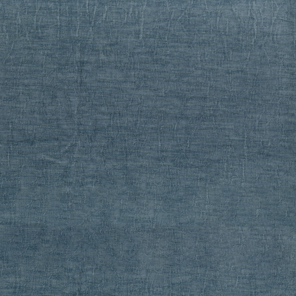 Slate blue textured fabric swatch with a linen-like weave and soft creases, ideal for upholstery or apparel.