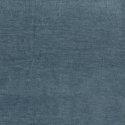 Slate blue textured fabric swatch with a linen-like weave and soft creases, ideal for upholstery or apparel.