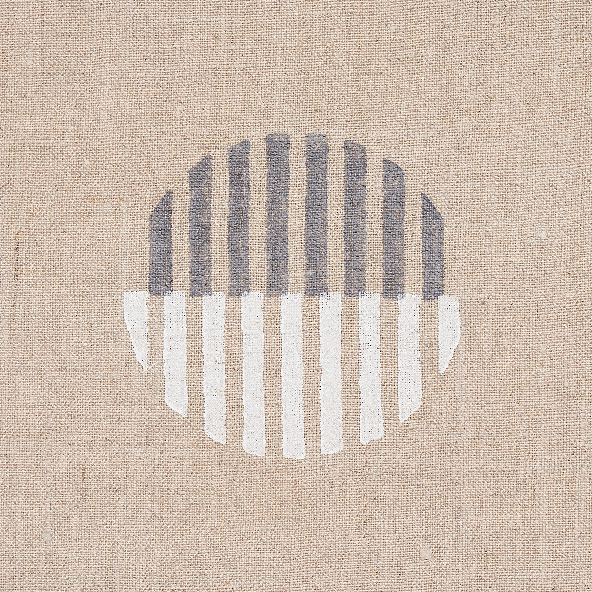 Natural background fabric with ivory and charcoal hand block prints.