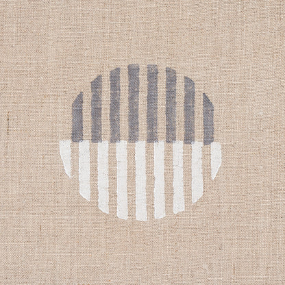 Natural background fabric with ivory and charcoal hand block prints.