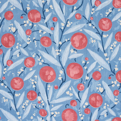 Blue botanical print fabric with red berries, pale blue leaves and tiny white blossoms; decorative pattern.
