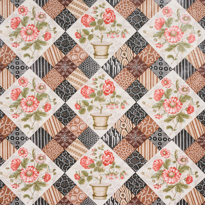 Diamond patchwork quilt pattern with white tiles featuring pink rose bouquets and brown geometric patches in earthy tones.