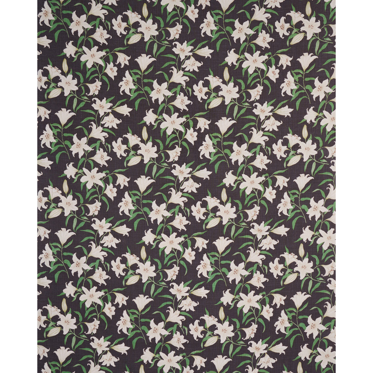 Dark fabric with repeating white lilies & green stems on black background; floral pattern for upholstery or apparel.