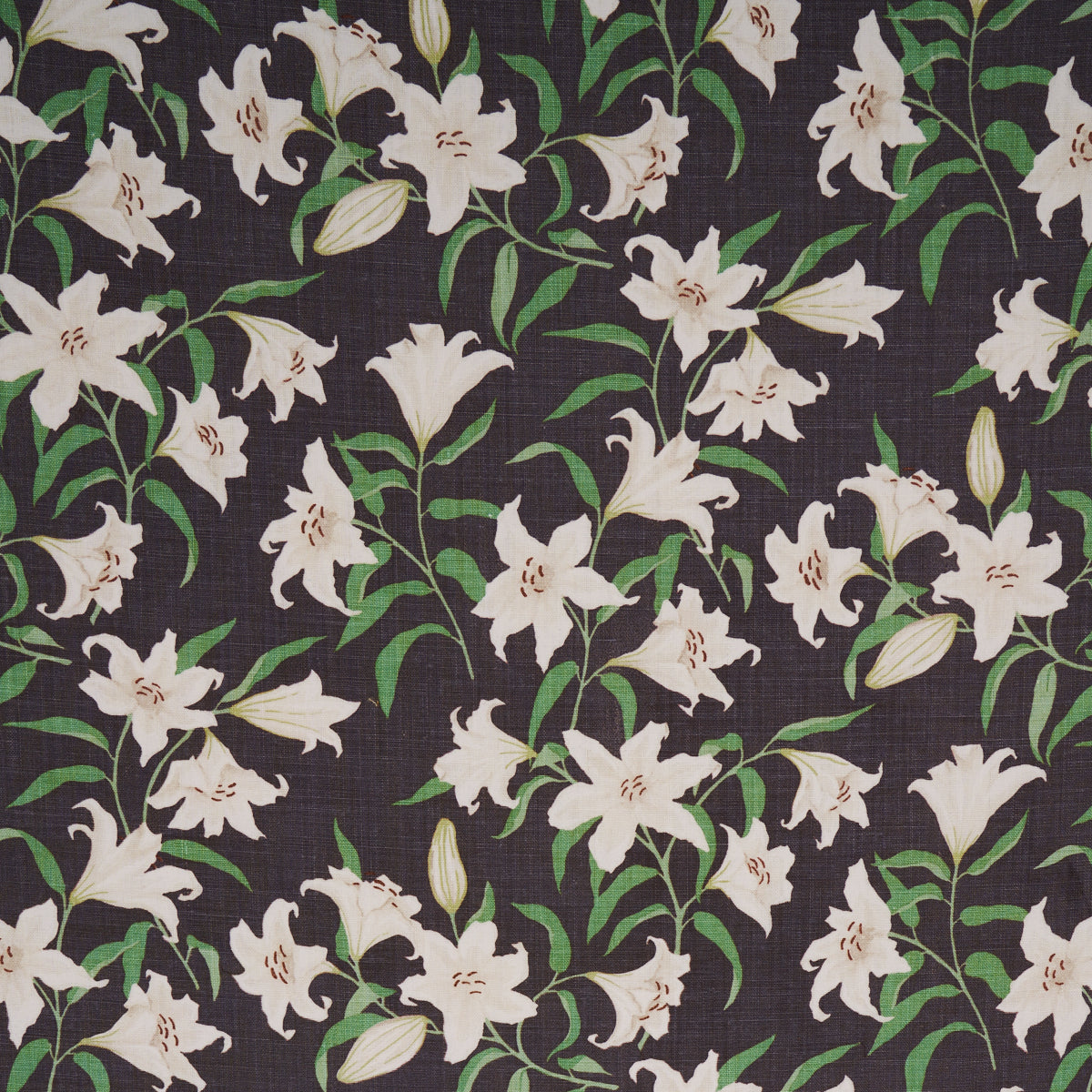 Charcoal fabric with dense white lily flowers and green stems, botanical floral print.