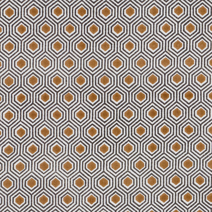 Geometric hex textile print with gray background, white and dark gray hex outlines, orange centers; modern retro decor