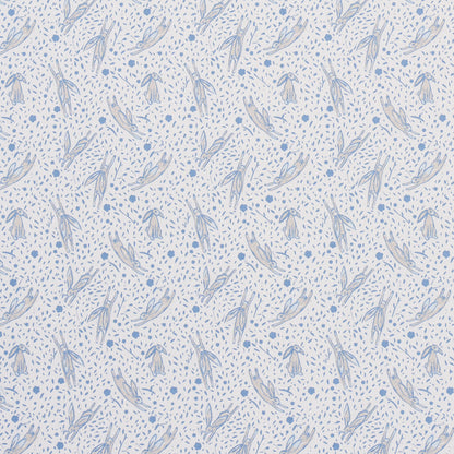Soft blue botanical print with slender leaves and tiny dots on a light background; seamless fabric pattern.