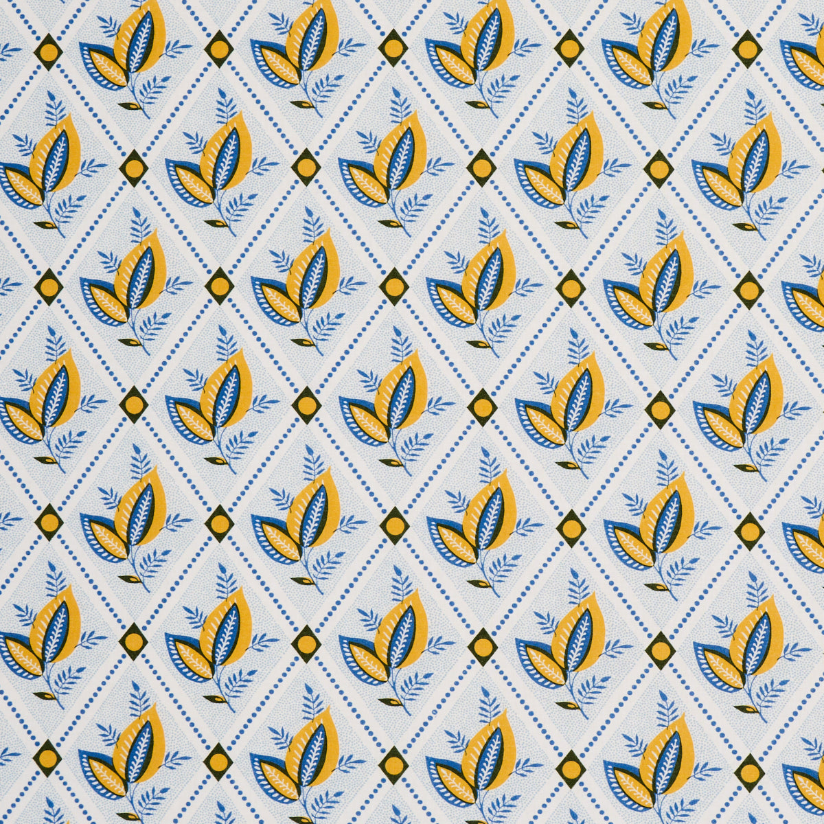 Patterned fabric: yellow and blue leaves in a diagonal lattice with small diamonds and blue sprigs on pale background.