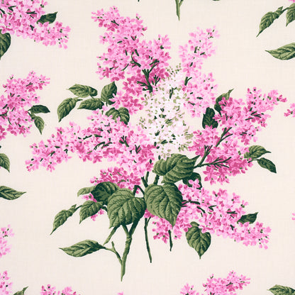 Cream background floral pattern with pink lilac blossoms and green leaves.