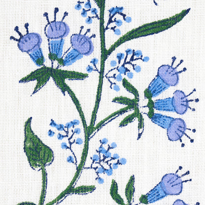 Hand block print lilac floral pattern with green stems and leaves on white fabric.