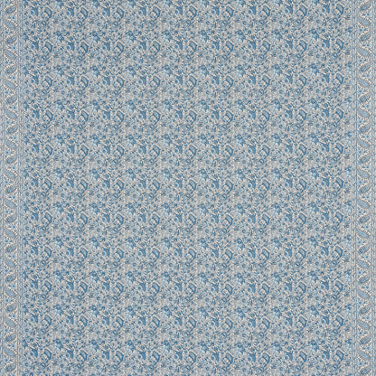 Blue damask-patterned textile with cream floral motifs and ornate border; rug-like fabric.