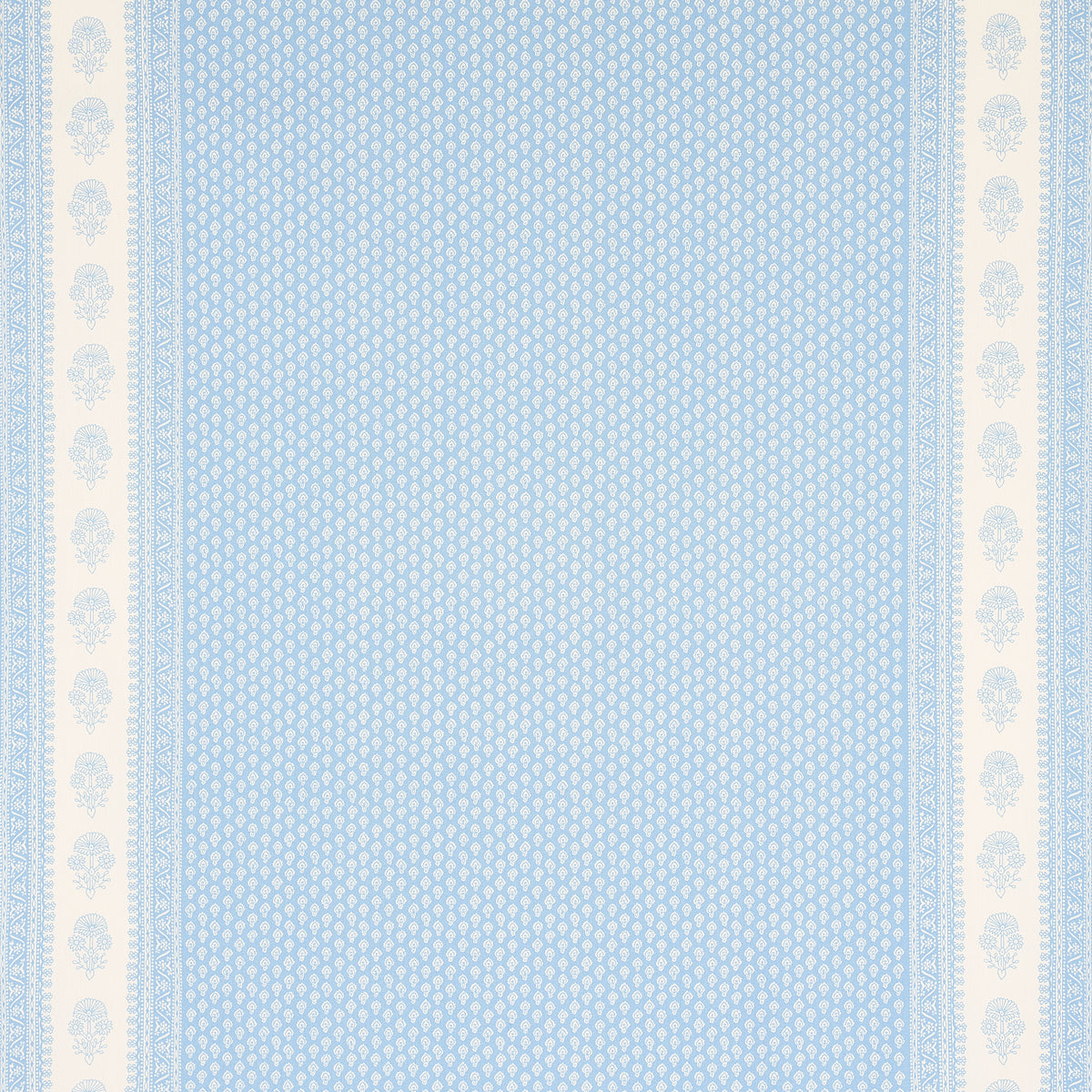 Blue and white textile with a dotted central field and pale-blue floral border along the edges.