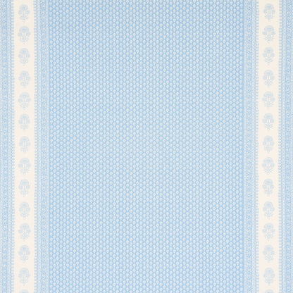 Blue and white textile with a dotted central field and pale-blue floral border along the edges.