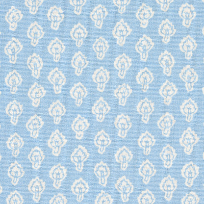 Light blue woven fabric with a repeating white teardrop/diamond floral motif; decorative textile.