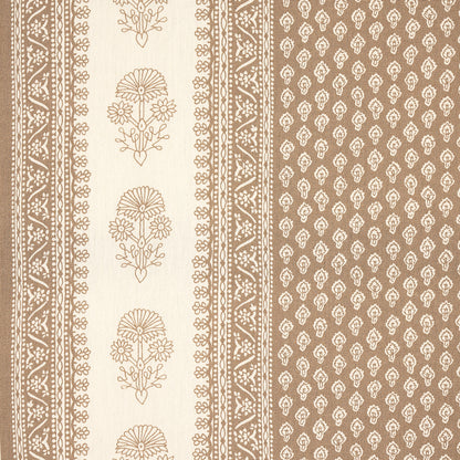 Beige wallpaper with ornate brown floral and geometric border on the left and a plain taupe field on the right.