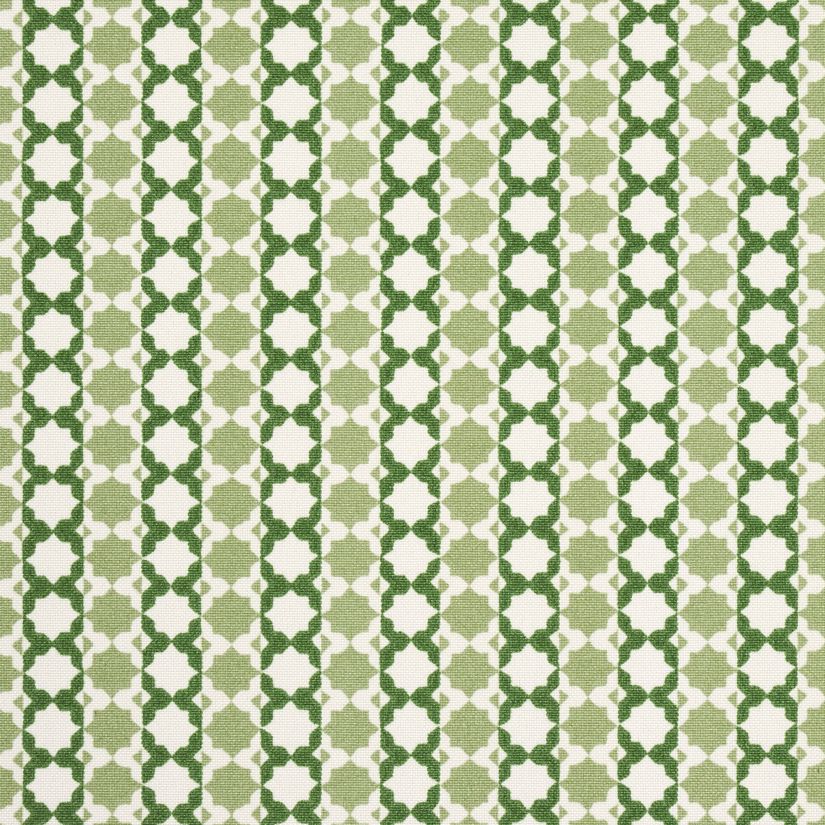 Patterned textile with vertical beige and dark green lattice star motifs; geometric retro fabric.