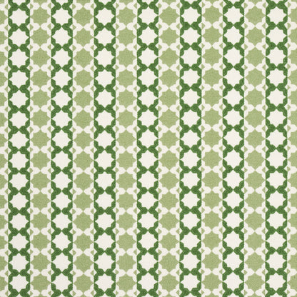 Patterned textile with vertical beige and dark green lattice star motifs; geometric retro fabric.