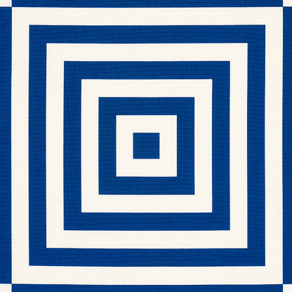 Blue and white concentric square pattern textile; modern rug featuring nested square frames.