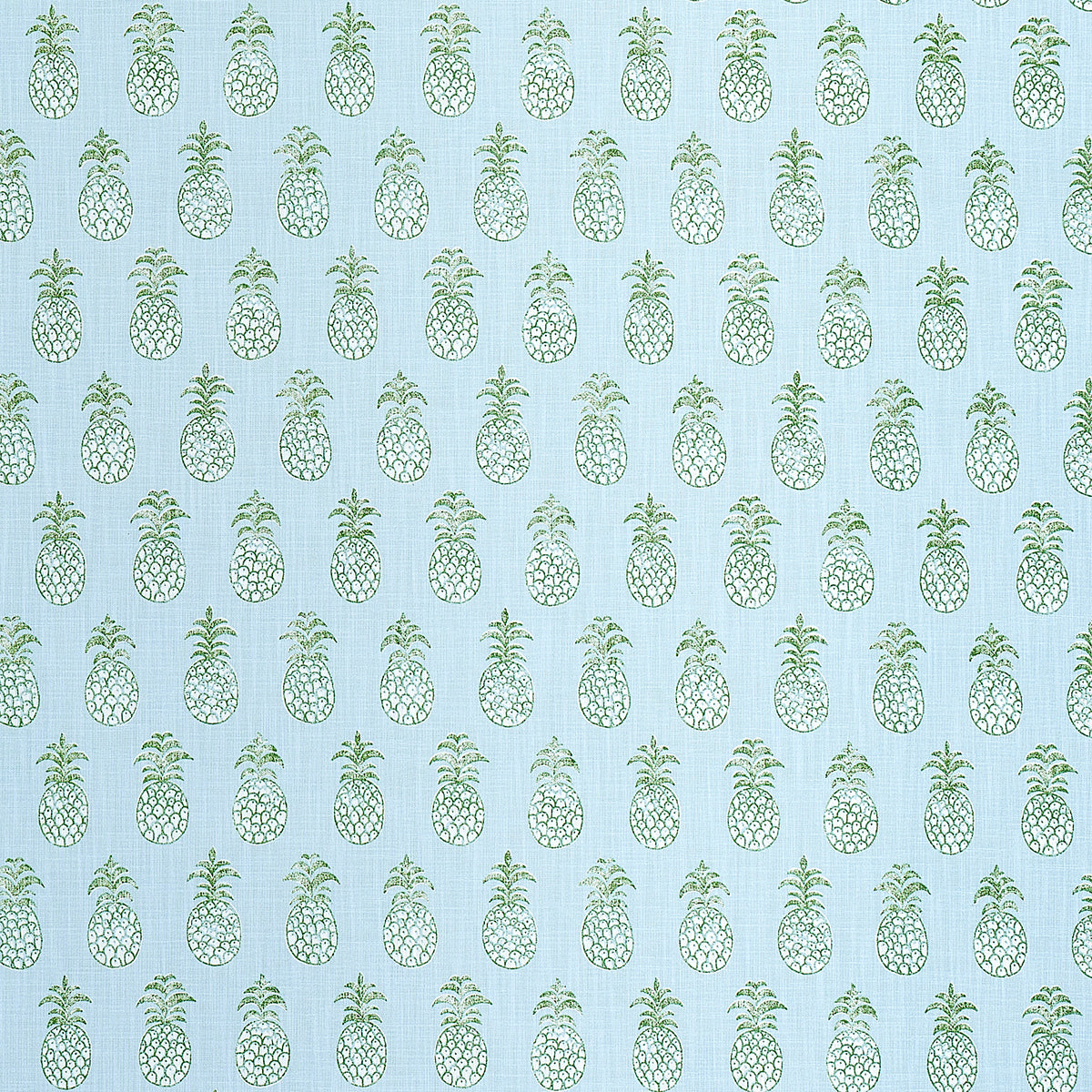 Repeating teal pineapple pattern on light blue fabric; tropical whimsical textile design.