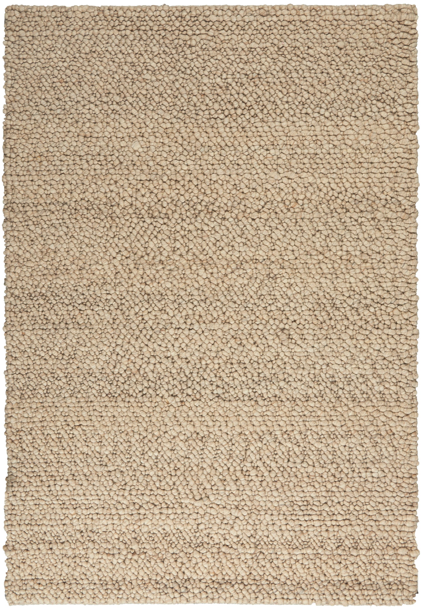 Beige shag rug with dense loop pile; rectangular, cozy floor covering for living rooms or bedrooms.