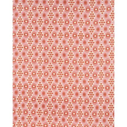 Pink and tangerine Ikat print fabric with a geometric pattern.