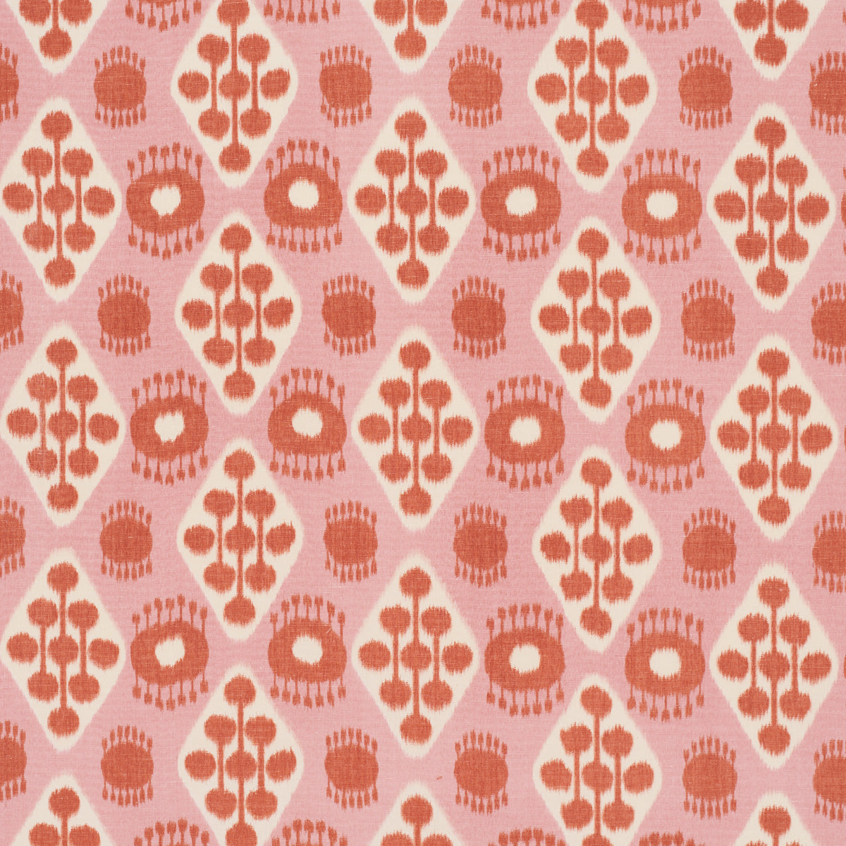 Soft pink fabric with peach orange diamond damask pattern and stylized floral motifs.