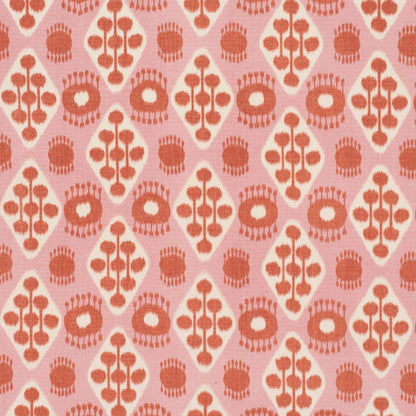 Soft pink fabric with peach orange diamond damask pattern and stylized floral motifs.