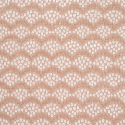 Peach lace fabric with repeating scalloped arches and dot clusters; delicate, sheer textile for dresses.