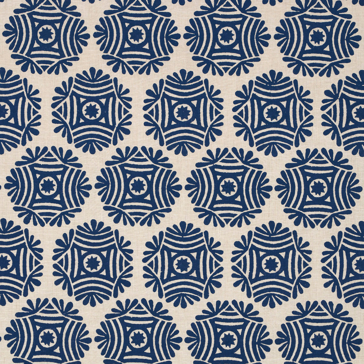 Navy blue circular geometric medallion pattern on natural fabric, with repeating star-like rosettes and radiating segments.