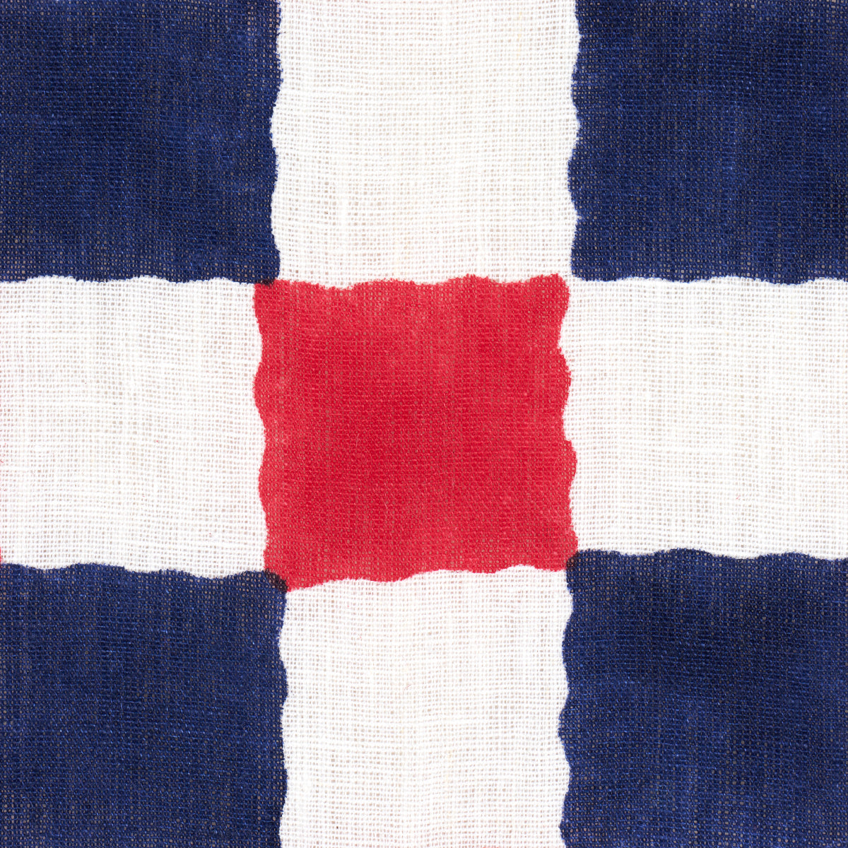 Chequer hand-block printed textile with a central red square framed by navy blocks and white spaces.