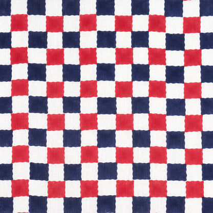 Red and navy blue checkered fabric pattern in small squares; versatile for table linens and crafts.