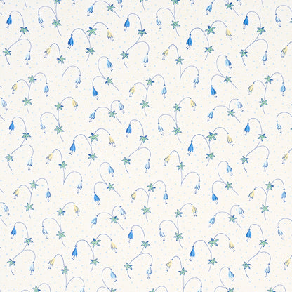 Cream fabric with watercolor-style blue and pale yellow florals on arching stems with palm-like leaves.