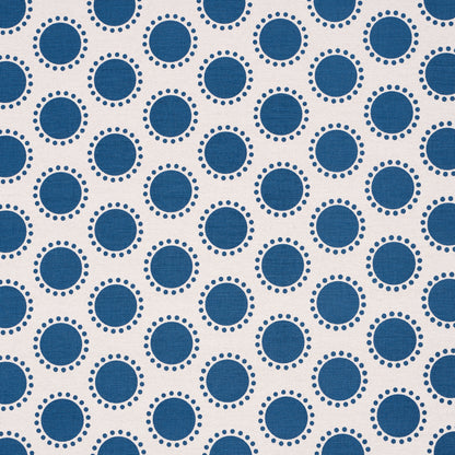 Beige fabric with repeating navy blue circles outlined by dotted rings; retro geometric polka-dot pattern.
