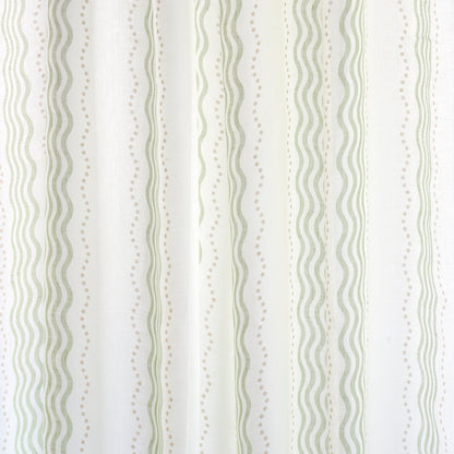 Cream fabric with vertical sage green wavy stripes and dotted accents; decorative textile pattern.