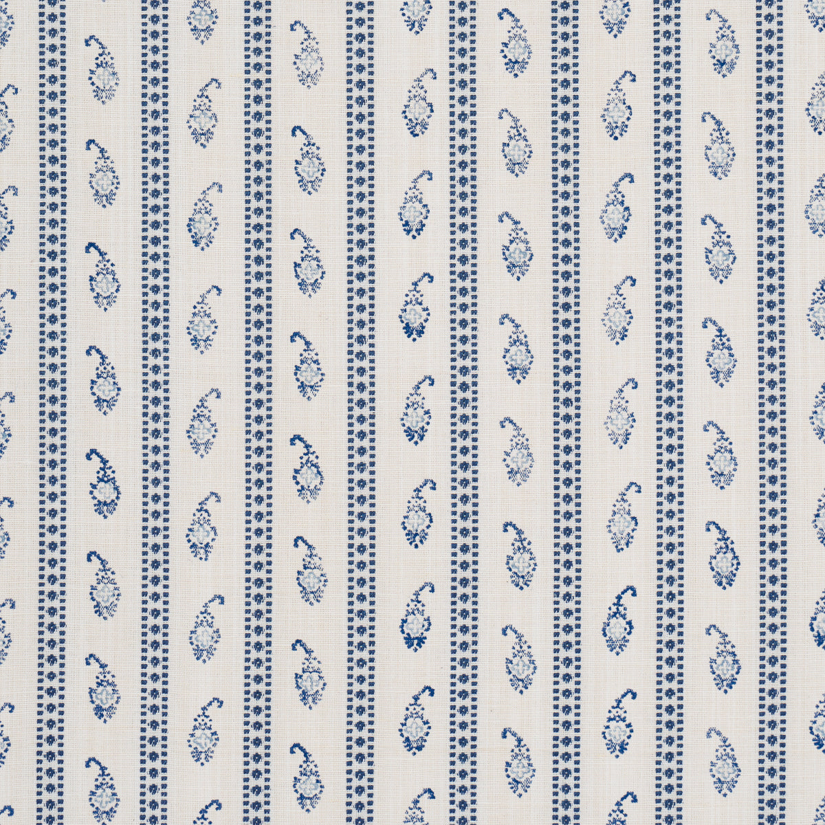 Cream woven fabric with vertical blue stripes - dots and paisley motifs; linen-look upholstery or drapery.