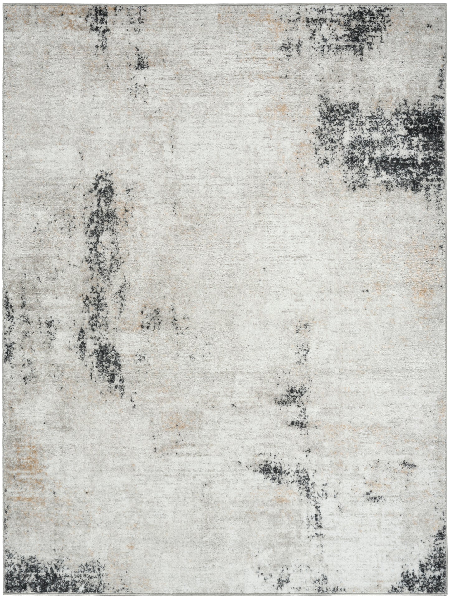 Abstract distressed cream & gray area rug with charcoal patches; rectangular, woven design.