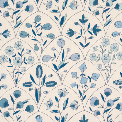 Cream wallpaper with blue floral and leaf motifs in an arched trellis pattern; decorative vintage botanical style.