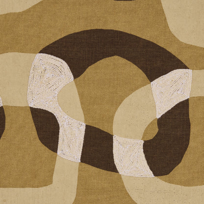 Abstract geometric rug in earthy beige, tan, & brown with white textured loops forming a circular knot.