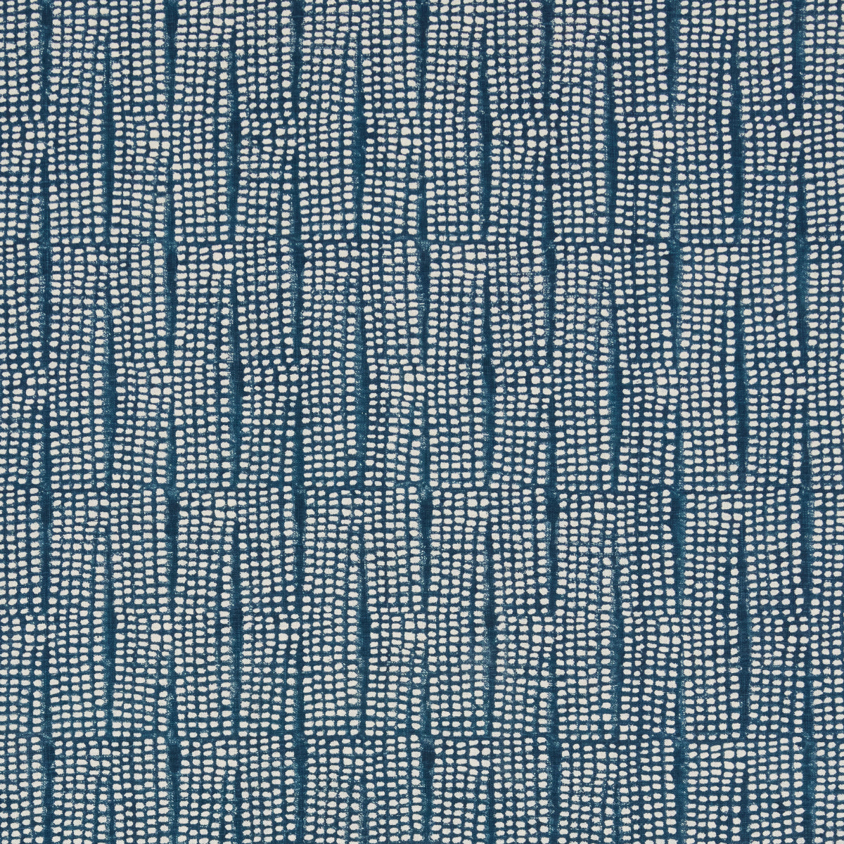 Blue woven fabric with white dotted vertical blocks forming a geometric ladder pattern; denim-inspired upholstery.