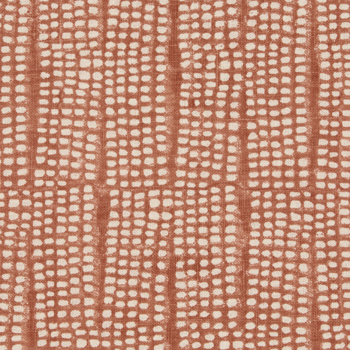 Rust orange fabric with cream dotted grid pattern; geometric textile suitable for upholstery or curtains.